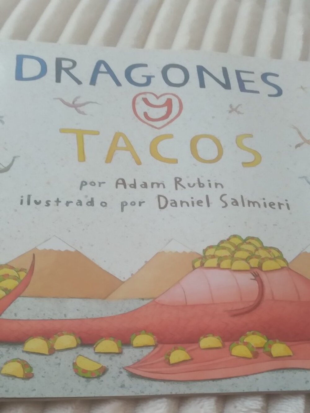 Spanish Version of Dragons Love Tacos Book by Adam Rubin